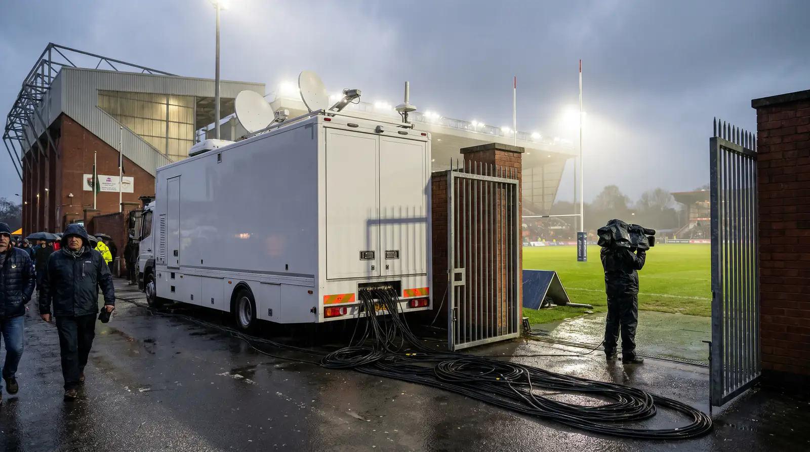 Rugby broadcast outside broadcast truck and cameras producing the live stream that drives latency