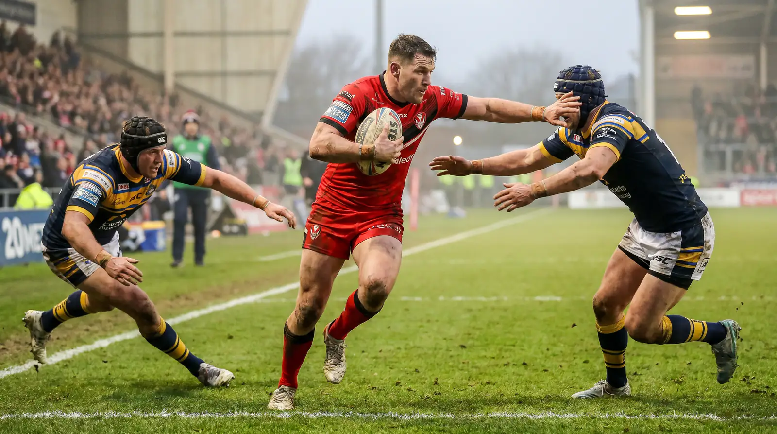 Rugby league try-scoring run with an attacker breaking through defenders in a Super League fixture